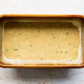 Zucchini bread batter in a loaf pan before baking.