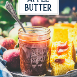 Jar of homemade crockpot apple butter with text title overlay