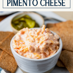 White bowl of pimento cheese with text title box at top