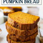 Stack of pumpkin bread slices with text title box at top