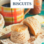 Two pumpkin spice biscuits on a plate with text title overlay