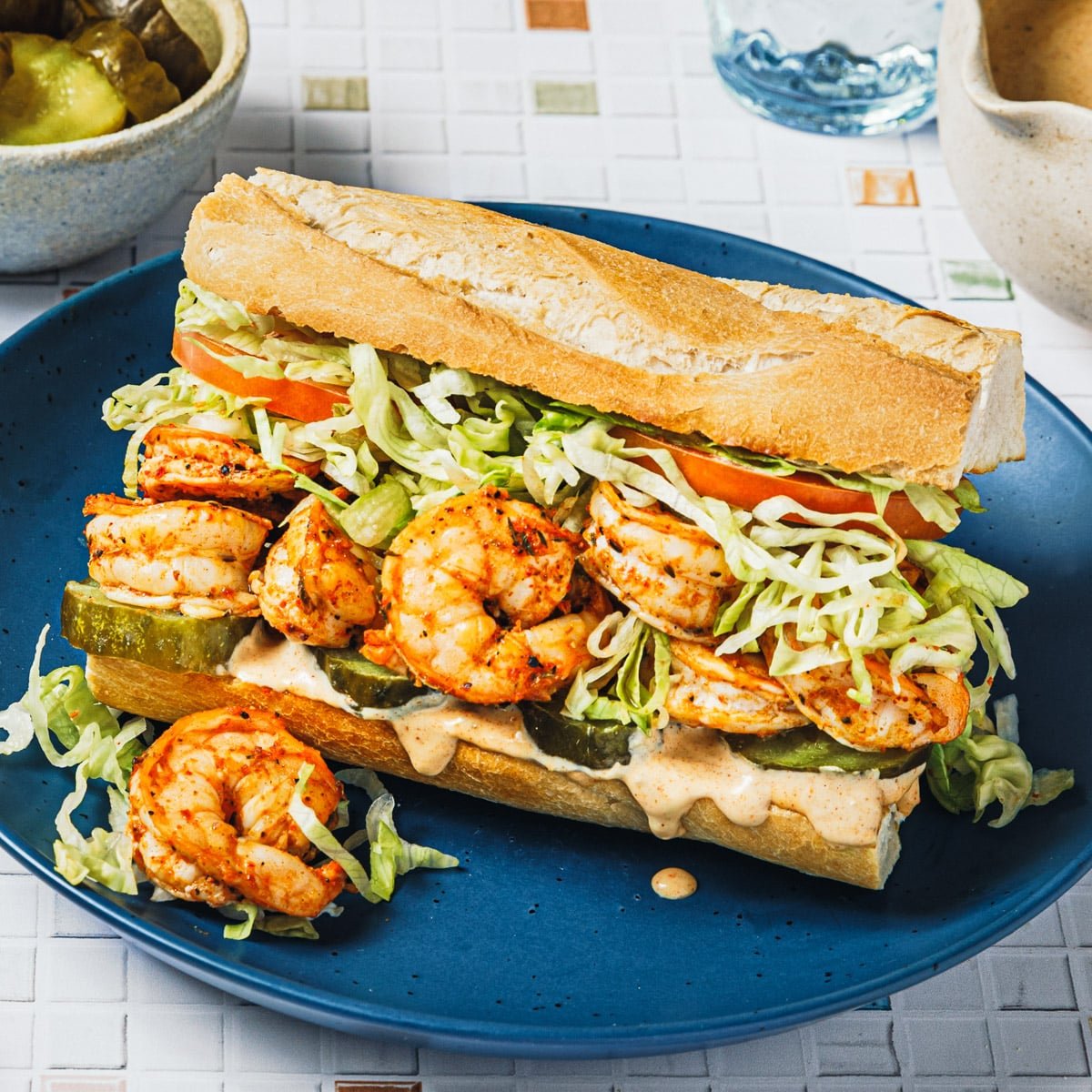 Square side shot of a baked shrimp po boy recipe.