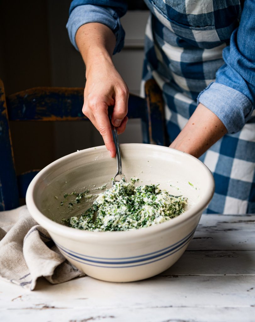 Spinach and ricotta filling in a large bowl