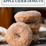 Stack of apple cider donuts with text title box at top