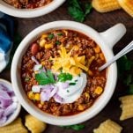 Square overhead shot of a bowl of classic beef chili