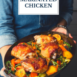 Hands holding a pan of buttermilk marinated chicken with text title overlay