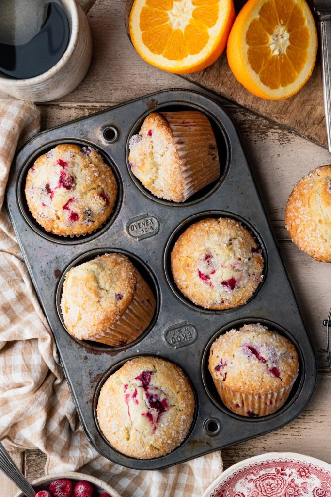 Overhead shot of cranberry orange muffins in a muffin tin