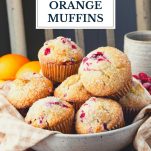Bowl of cranberry orange muffins with text title overlay