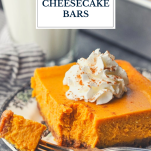 Bite of pumpkin cheesecake bars on a fork with text title overlay