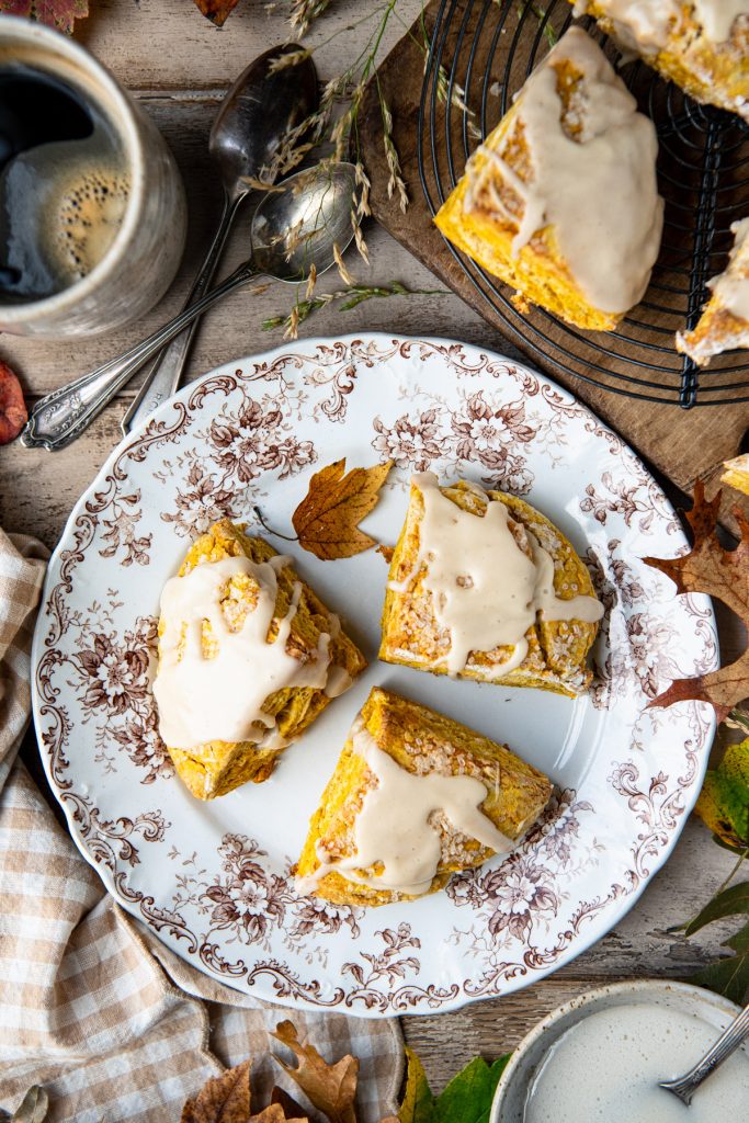 Maple glazed pumpkin scones on a plate