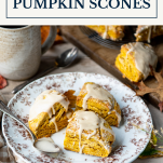 Side shot of a plate of pumpkin scones with text title box at top