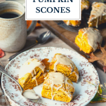 Side shot of a table of pumpkin scones with text title overlay