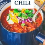 Close up shot of a bowl of taco chili with text title overlay