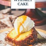 Slice of whiskey cake recipe with text title overlay