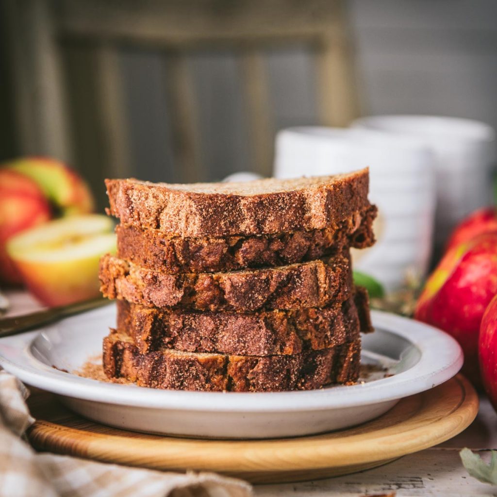Square shot of a stack of apple bread slices on a plate