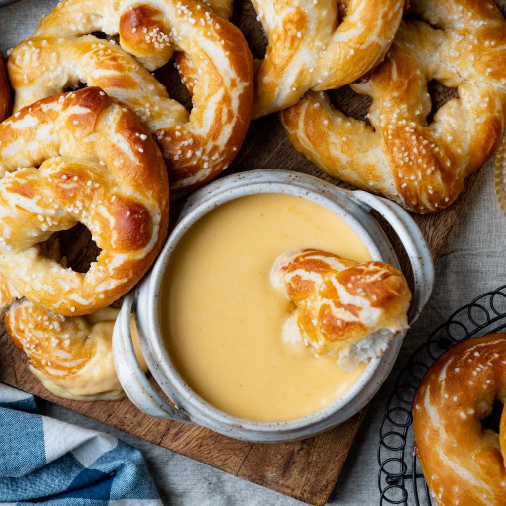 Square overhead image of hot beer cheese dip