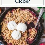 Skillet of cranberry apple crisp with text title box at top