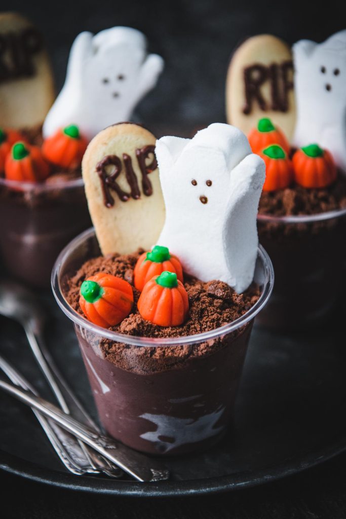 Close up shot of halloween dessert pudding cups