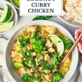 Hands eating a bowl of coconut curry chicken with text title overlay