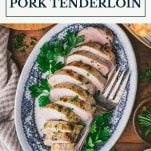 Plate of ranch pork tenderloin in the oven with text title box at top