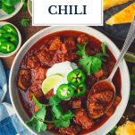 Overhead image of a bowl of texas chili with text title overlay