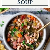 Overhead shot of a bowl of Southern black eyed pea soup with text title box at top