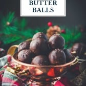 Side shot of a bowl of salted dark chocolate peanut butter balls with text title overlay