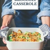 Hands serving an easy broccoli casserole with text title overlay