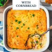 Spoon in a dish of leftover ham casserole with cornbread topping and text title overlay