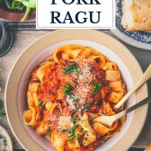 Overhead shot of a bowl of pasta with pork ragu and text title overlay