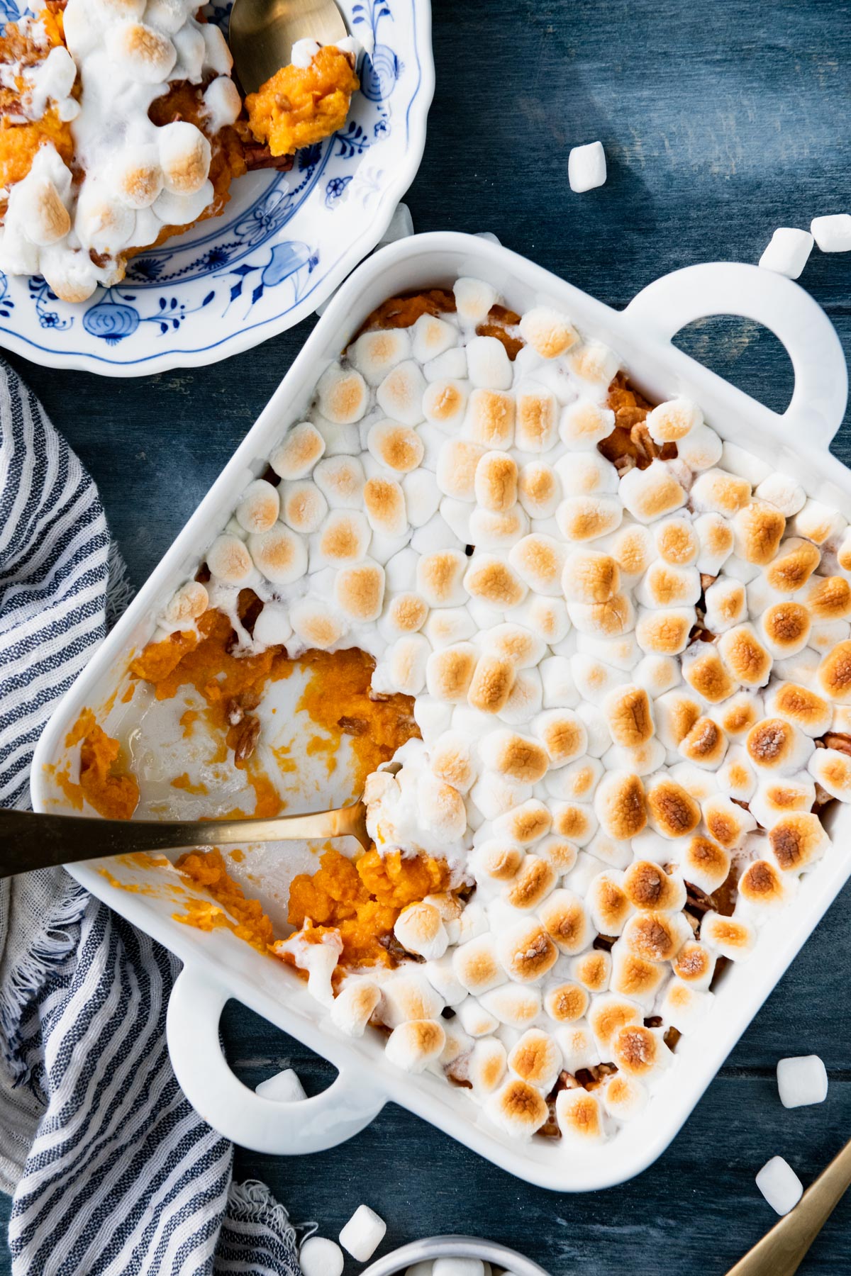 Overhead shot of southern sweet potato casserole with pecans and marshmallows