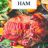 Sliced baked ham with bourbon glaze and text title overlay