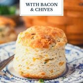 Cheddar biscuit on a plate with text title overlay