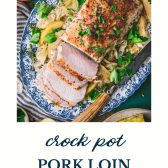Overhead shot of crock pot pork loin with text title at bottom