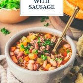 Side shot of 15 bean soup with sausage and text title overlay