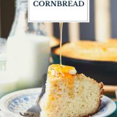 Honey on a slice of cast iron cornbread with text title overlay