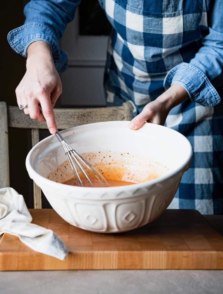 Whisking together sauce