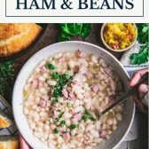 Hands eating a bowl of ham and beans with text title box at top.