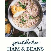 Overhead shot of a bowl of ham and beans with text title at the bottom.