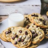 Platter of chocolate chip pudding cookies with a glass of milk