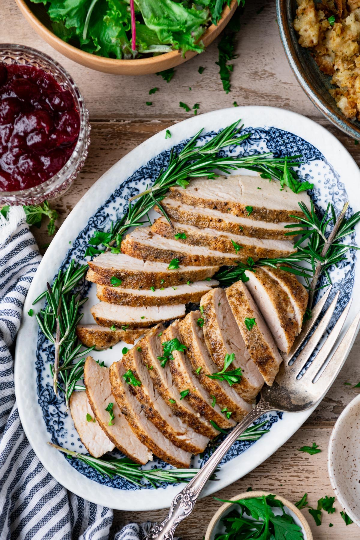 Overhead shot of a platter of sliced crock pot turkey tenderloin