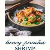 Bowl of honey sriracha shrimp with text title at the bottom.
