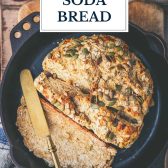 Overhead shot of a skillet of molasses oatmeal soda bread with text title overlay.