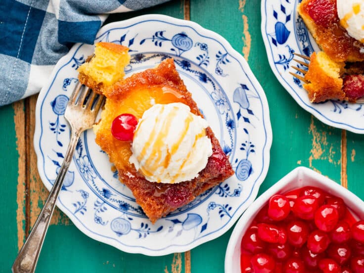 Horizontal shot of a slice of pineapple upside down cake.