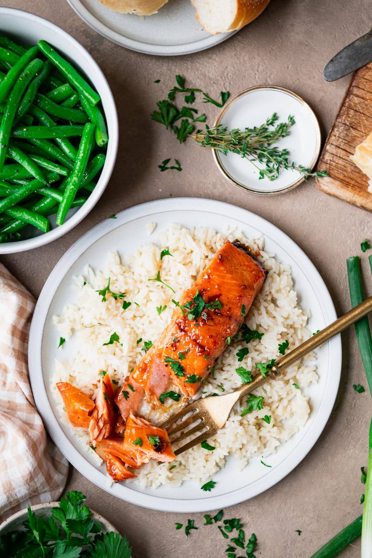 Overhead image of bourbon glazed salmon on a plate with rice