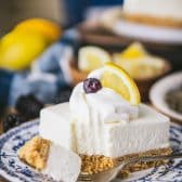 Easy lemon bars with graham cracker crust on a blue and white plate