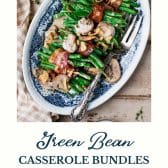 Plate of green bean casserole bundles with bacon and text title at the bottom.