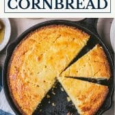 Skillet of honey butter cornbread with text title box at top.