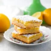 Square side shot of a stack of homemade lemon squares