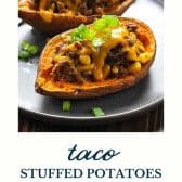 Taco stuffed potatoes on a plate with text title at the bottom